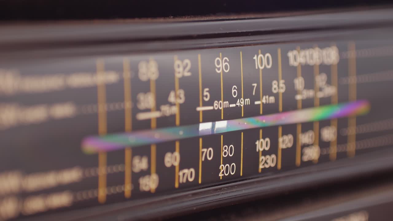 Retro radio tape recorder close-up. Listening to music, old radio boombox player, searching channel.