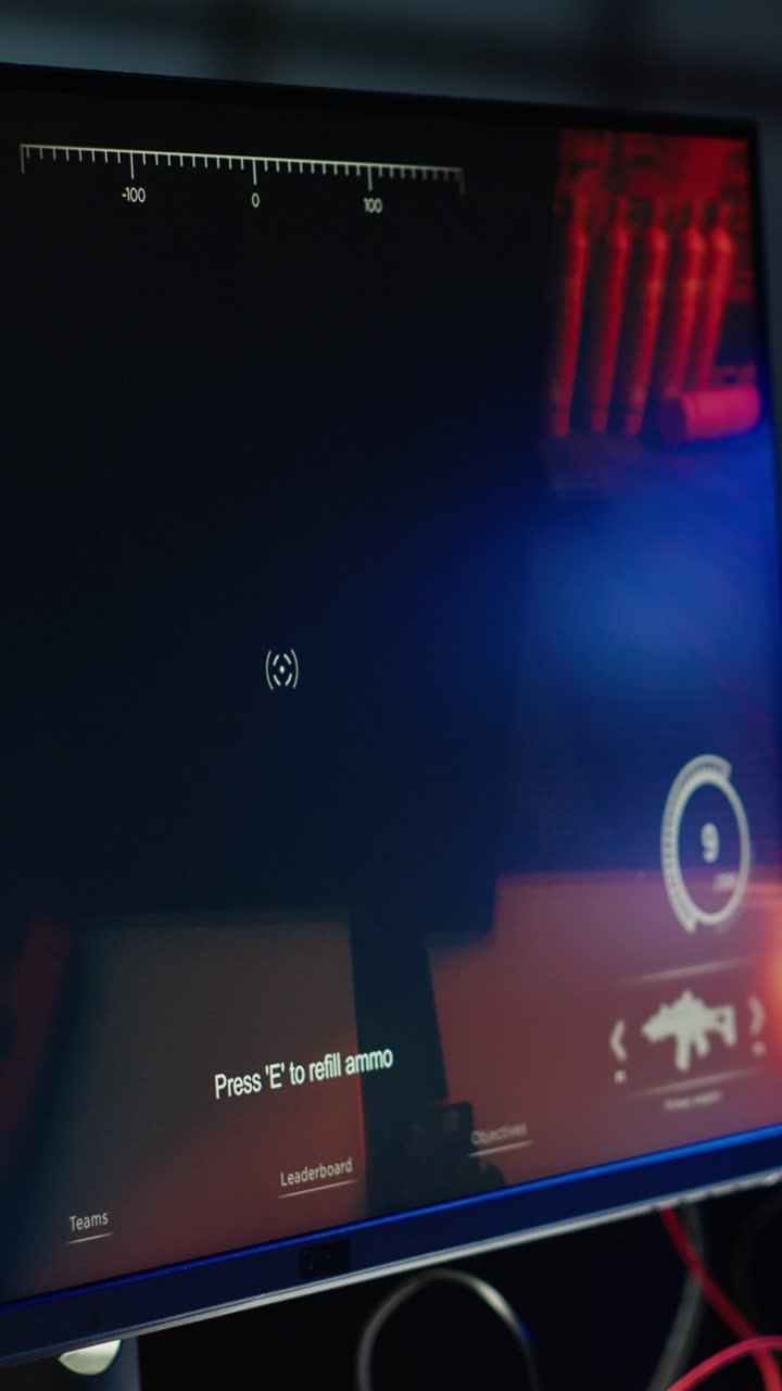 Vertical video Close up of first person shooter game on computer display