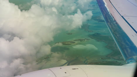 long lens video clip of the florida keys, filmed from the window seat of a delta flight leaving key west at about 7,000 feet