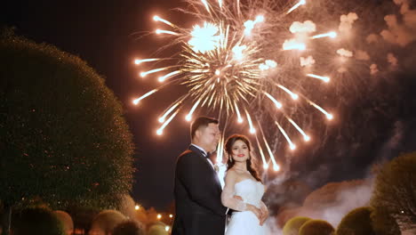 Bride and Groom Celebrate Wedding with Spectacular Fireworks at Night