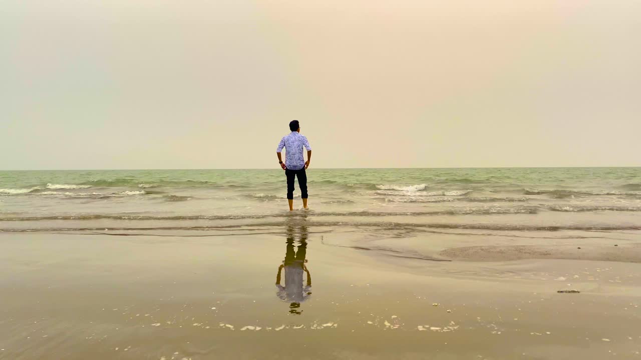 Lonely Man Contemplating On The Calm Shores Of Kuakata Beach, Bangladesh. Slow Motion Shot