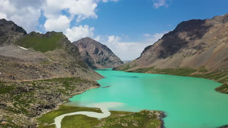 rotating drone shot of the ala-kol lake in kyrgyzstan