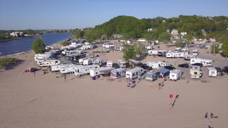 drone shot of an rv campground on the beach