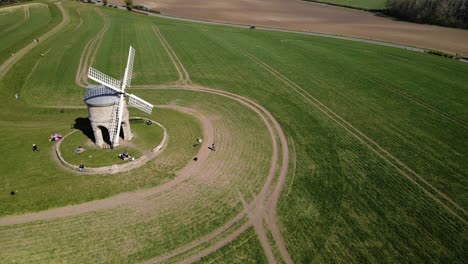 landmark chesterton historic windmill aerial orbit right view across english rural countryside agricultural field