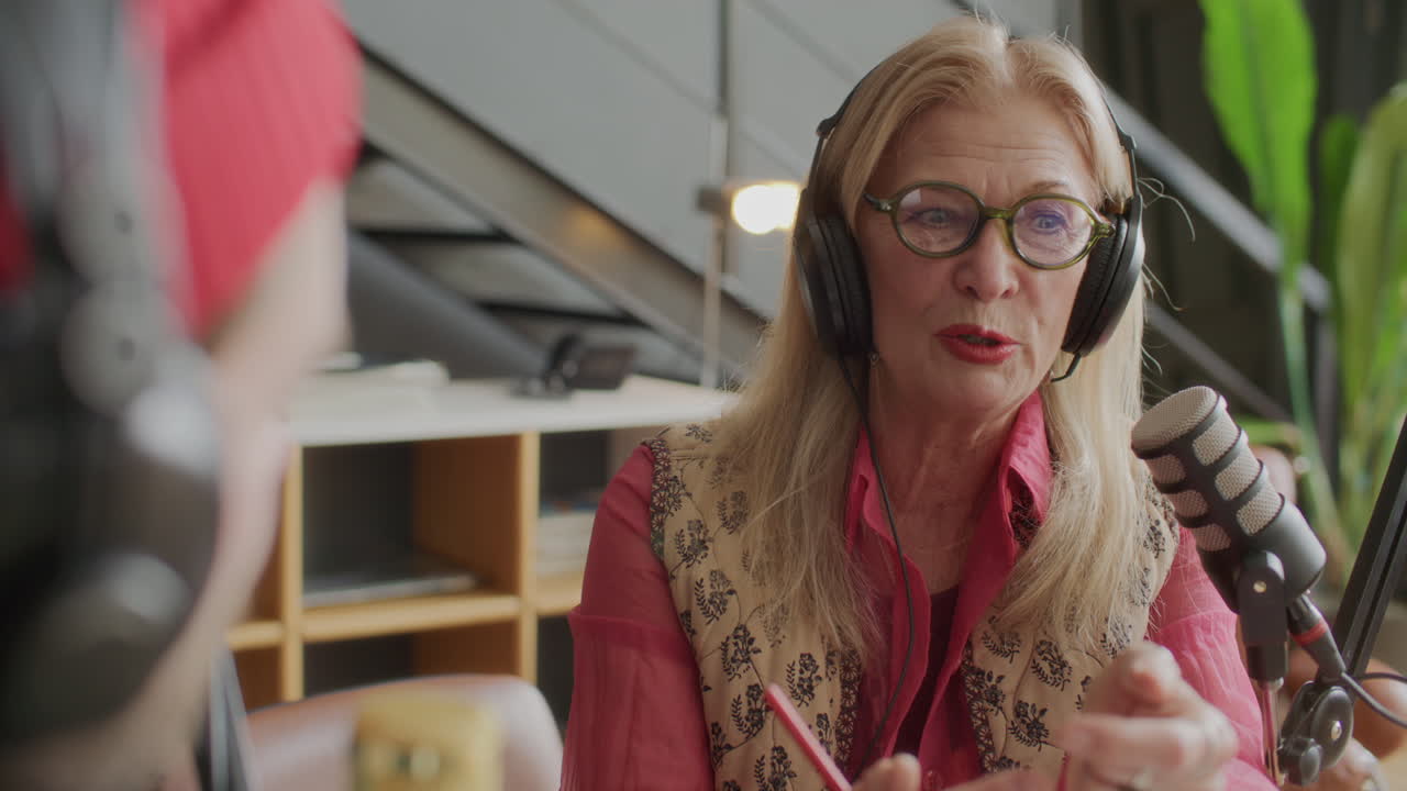 Senior Woman Speaking in Mic as Recording Podcast Interview