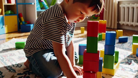 Toddler Playing with Wooden Blocks