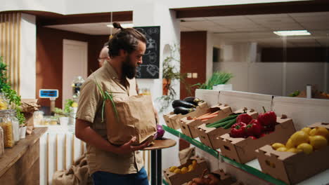 man buys ethically sourced vegetables