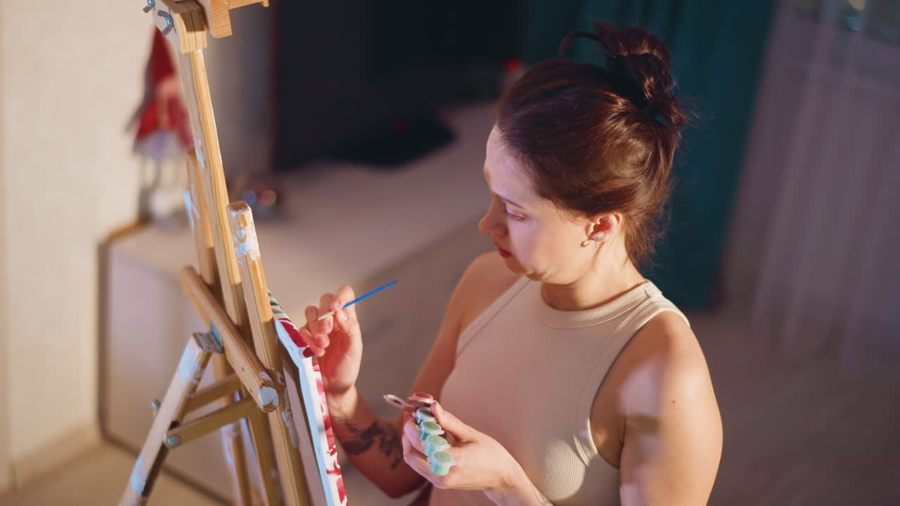 Caucasian Artist Applying Fine Brushstrokes On Canvas, Intimate LateNight Studio Lighting, Careful Color Mixing On Palette, Concentrated Movement And Steady Hand, Immersive Creative Flow