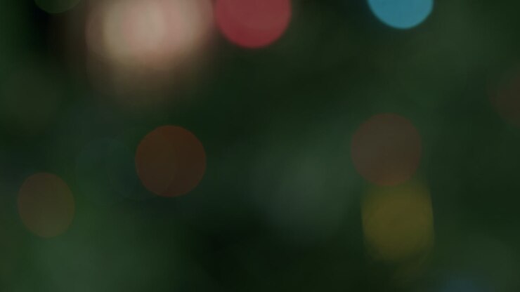Christmas garland in defocus. Unfocused close up view. Shallow depth of field.