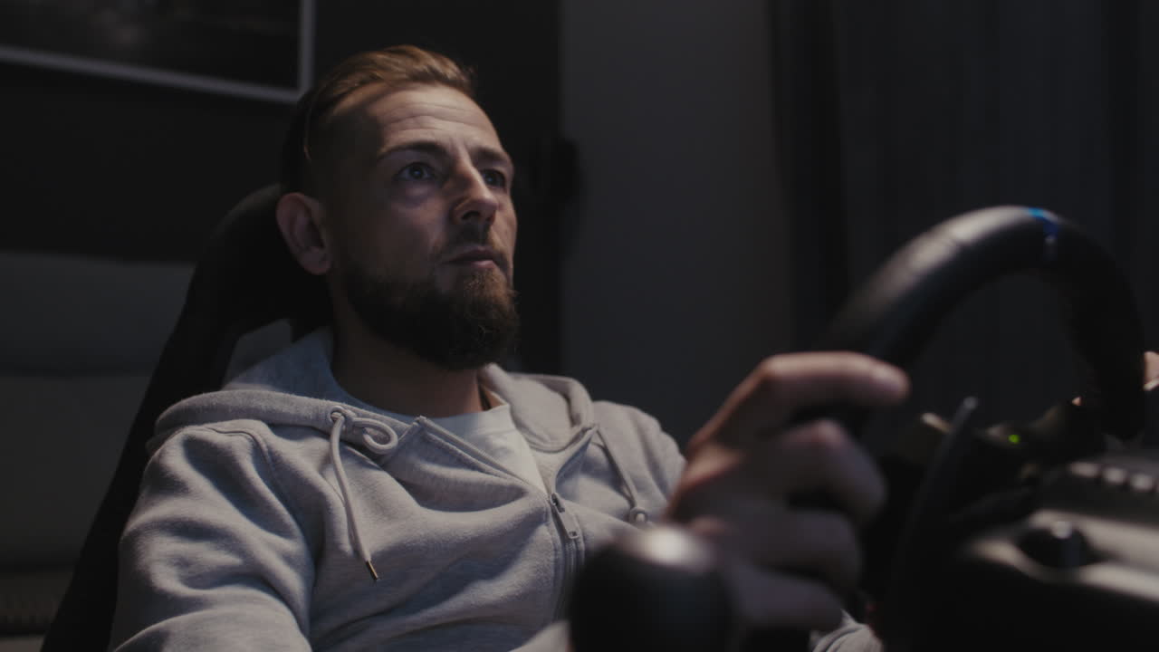 Man Playing Racing Video Game