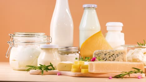 assorted dairy items against an orange background