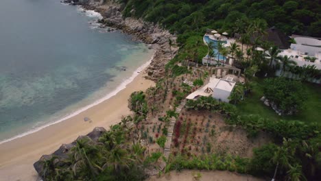 Aerial-over-landscape-along-the-mesmerizing-coastline-in-Huatulco,-Mexico