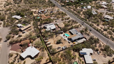 Tucson-Arizona-Aerial-v3-birds-eye-view-flyover-Casas-Adobes-neighborhood-capturing-Casas-Catalinas-homes,-tilt-up-along-Orange-Grove-road-to-desert-mountainscape---Shot-with-Mavic-3-Cine---March-2022
