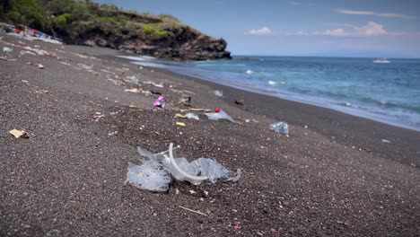 litter on the seacoast of tropical beach in bali, indonesia