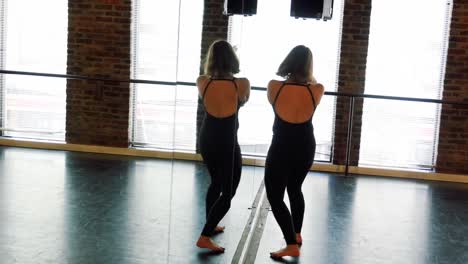 Ballerina-practicing-in-front-of-mirror