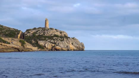 a lighthouse in a cliff