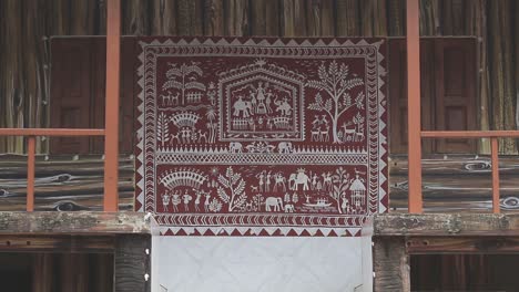 static footage of native painting style on a tribal hut in sri lanka