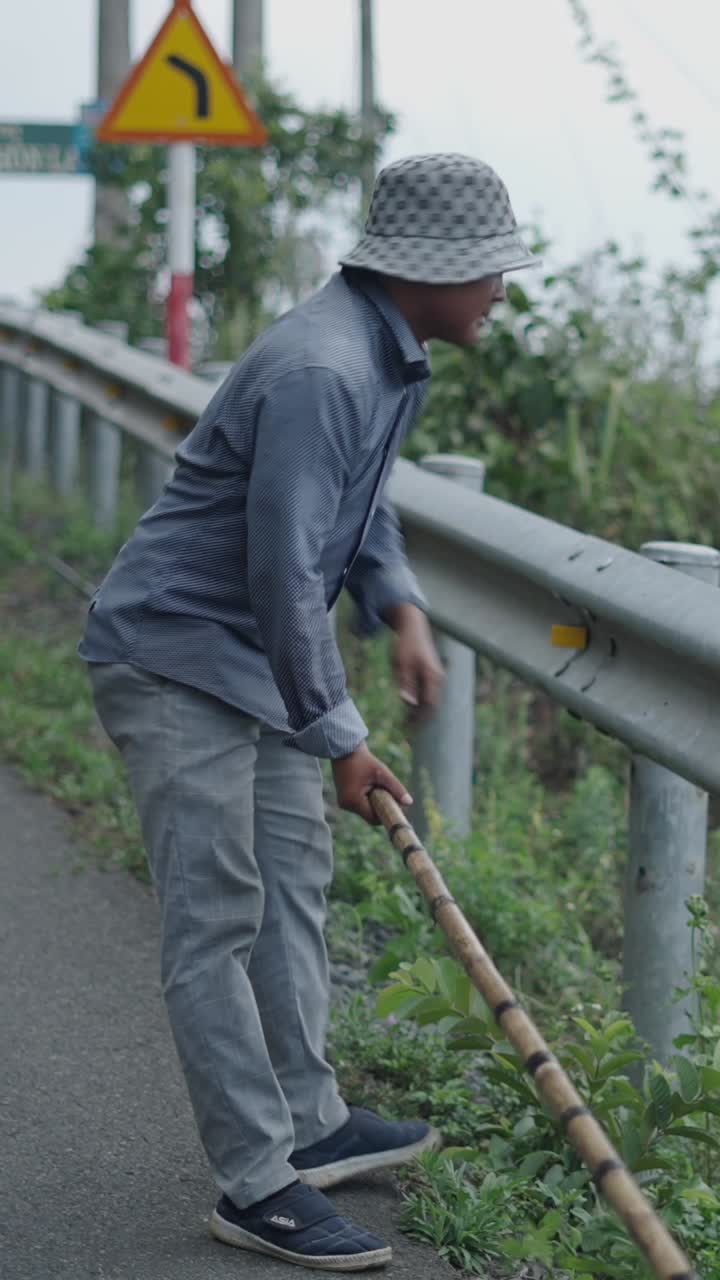 Man working on roadside utilities