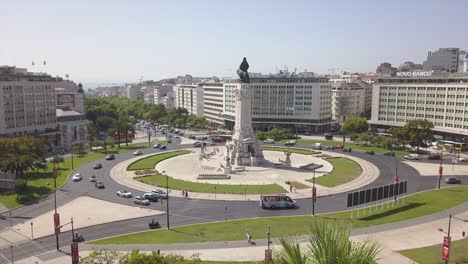 sunny day lisbon city marquess of pombal square aerial traffic panorama 4k portugal