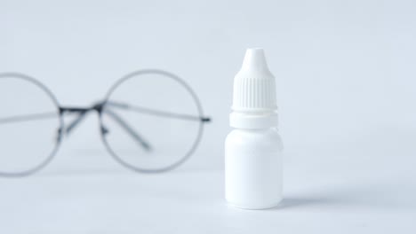 eye drops and glasses