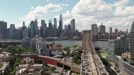 gorgeous nyc skyline drone shot with brooklyn bridge in foreground, 4k