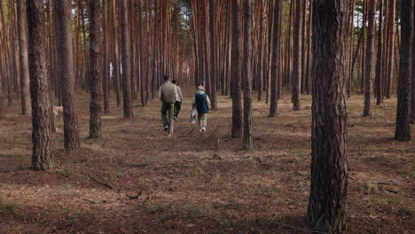 family hiking in the woods