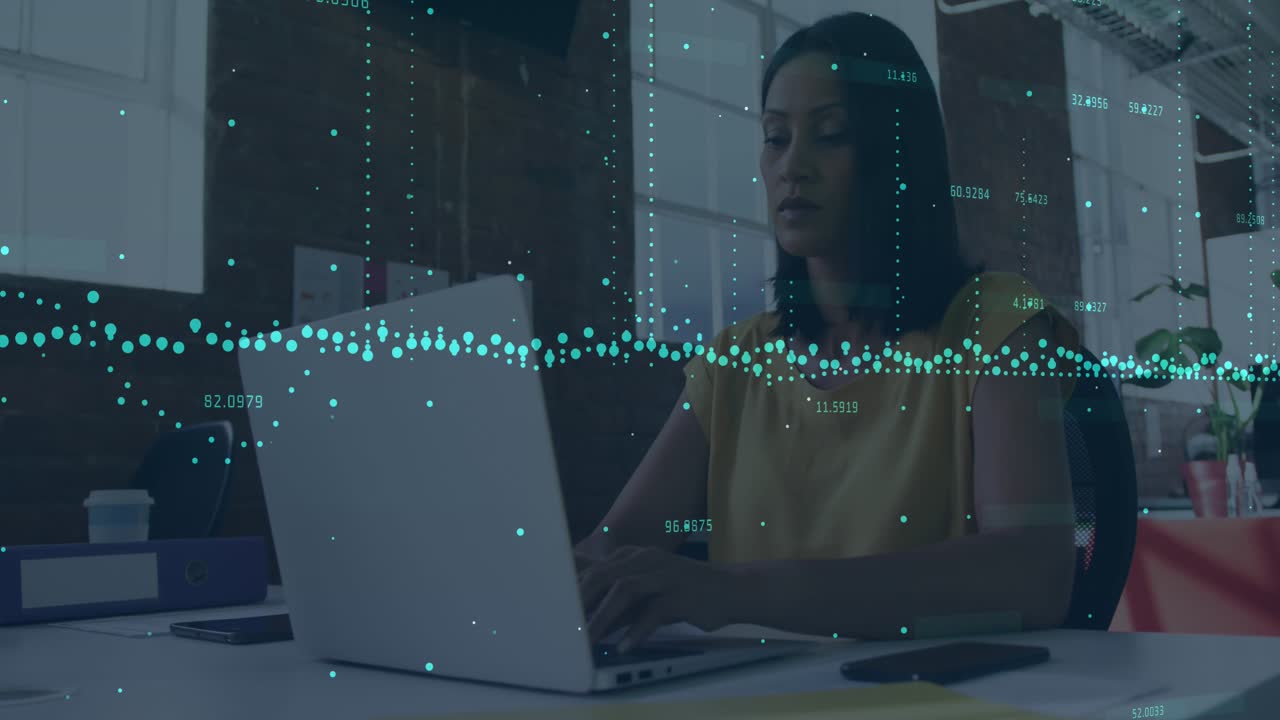 Animation of graphs with changing numbers over thoughtful asian woman working on laptop