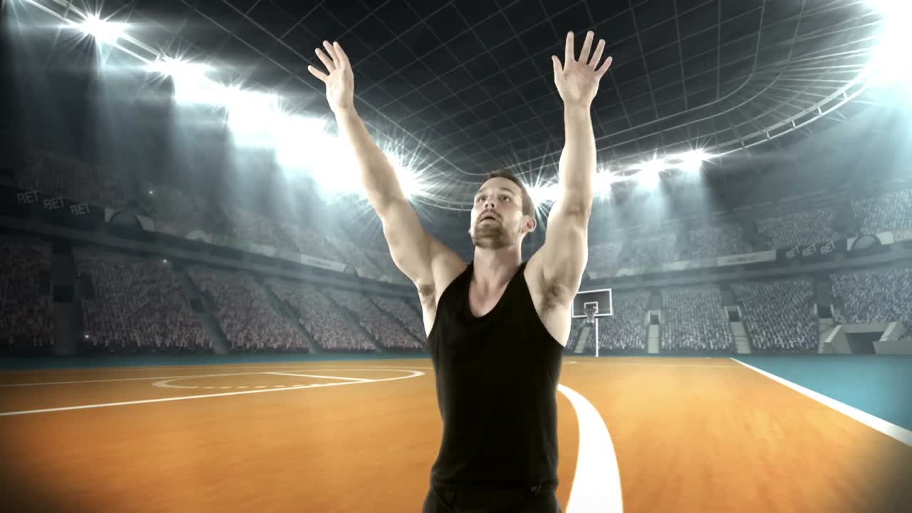 농구 선수가 공을  ⁇ 고 있다