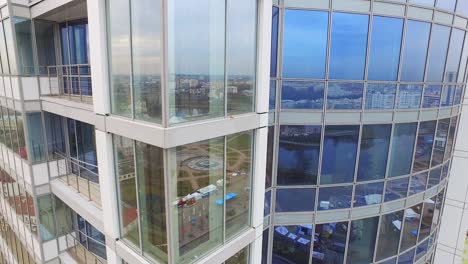 Reflection-city-in-glass-windows-business-building.-Business-center-building