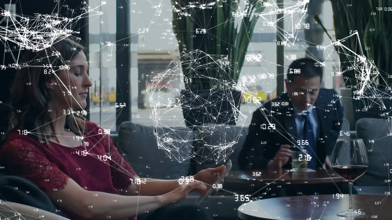 Animation of network of connections over businesspeople using digital devices
