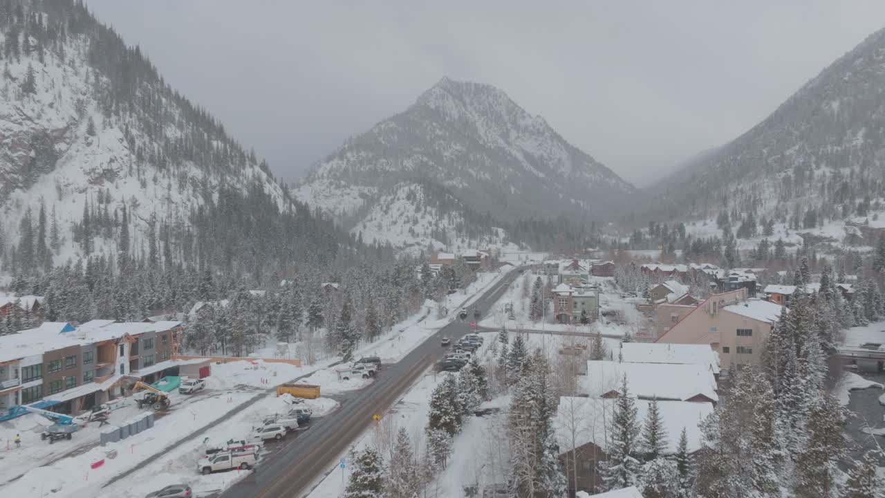 Drone flying over downtown fresco in Colorado. USA in a winter morning. Snowy landscape.