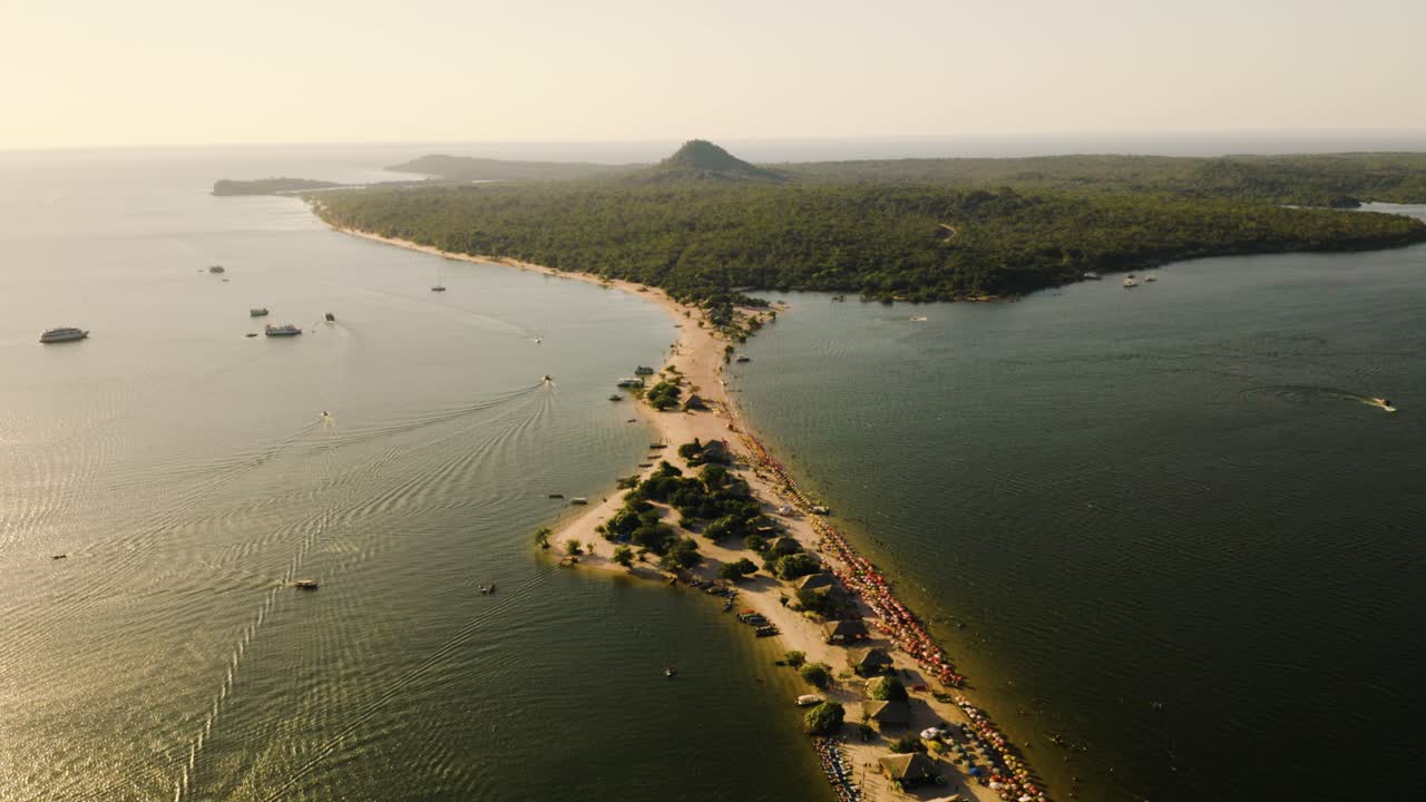 An aerial view of Alter do Chão sand spit at sunset in the Brazilian Amazon