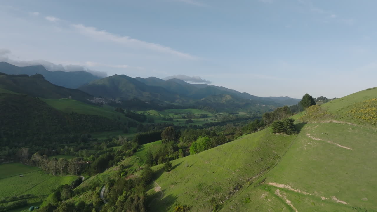 Rolling green hills and mountains of the Motueka valley, New Zealand