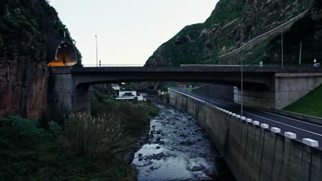 bridge over a river in a mountainous area