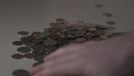 sorting various coins from a pile