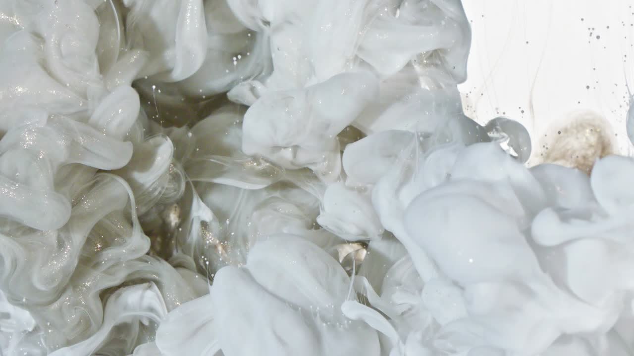 White and Gold Ink in Water