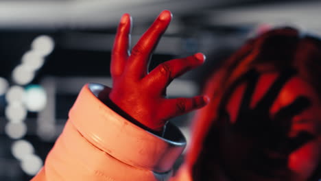 astronaut blinded by red light from alien vessel while mapping unknown worlds