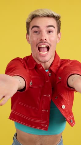 man making heart shape with his hands