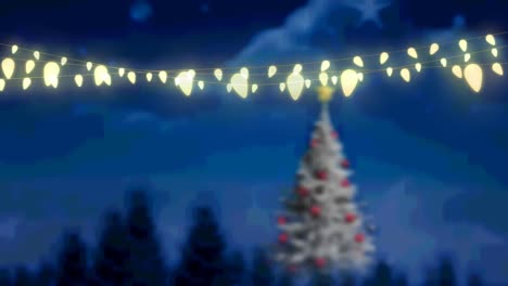 Animation-of-glowing-fairy-lights-over-christmas-tree-and-winter-landscape