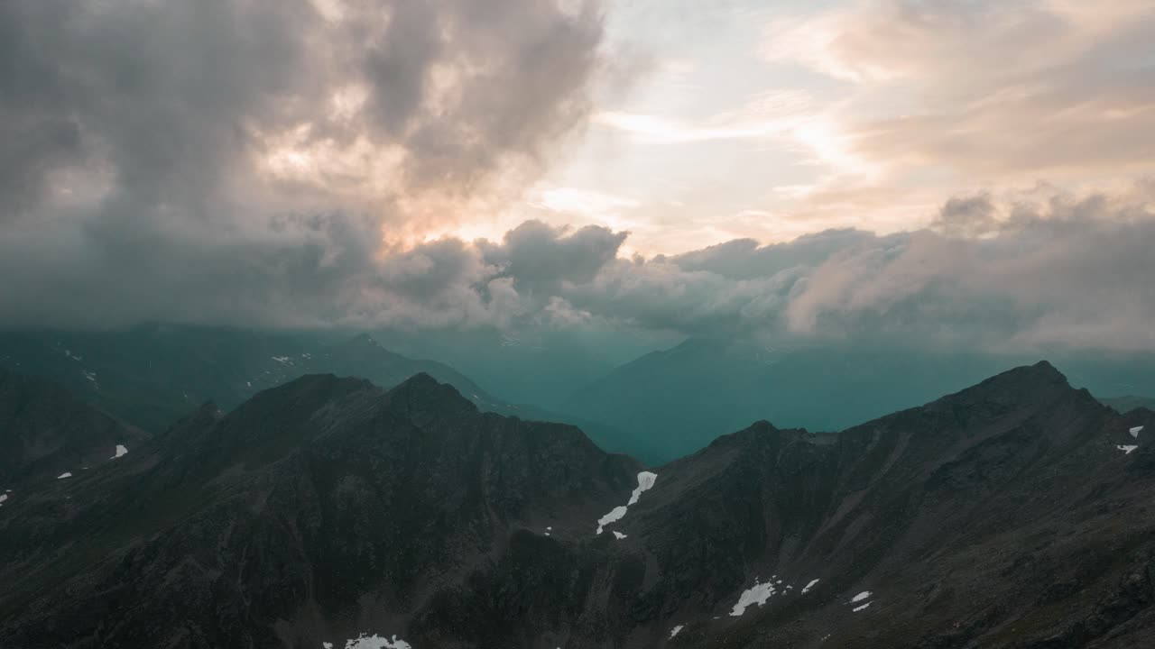 Dramatic Sunset over Mountain Peaks