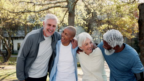 four smiling friends enjoying a workout together in the park