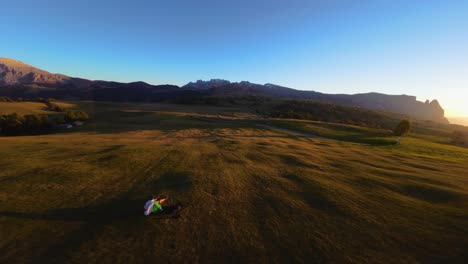 mountains, forest and fields filmed at alpe di siusi in european alps, italian dolomites filmed in vibrant colors at sunset