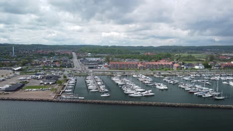 Aabenraa Denmark aerial view showing boats docked at a marina with city backdrop