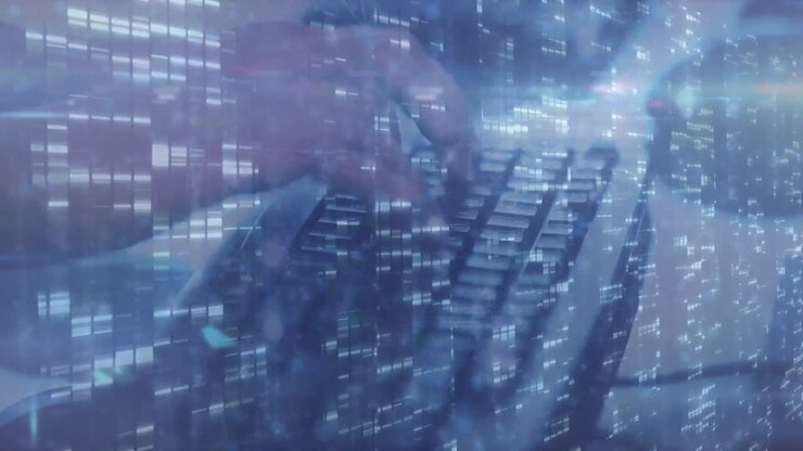 Animation of data processing over hands typing on computer keyboard