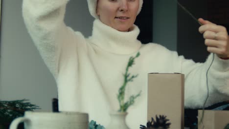 woman creating christmas decorations