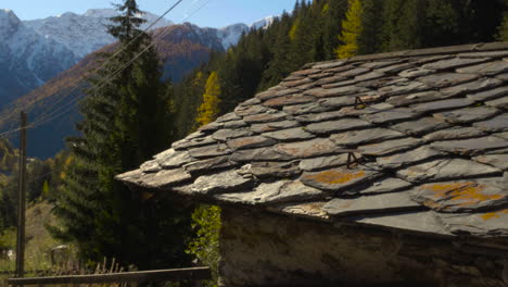 a view of an old ancient mysterious house roof made by stones in the mountains