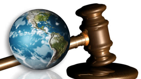 the earth and a gavel. concept of justice