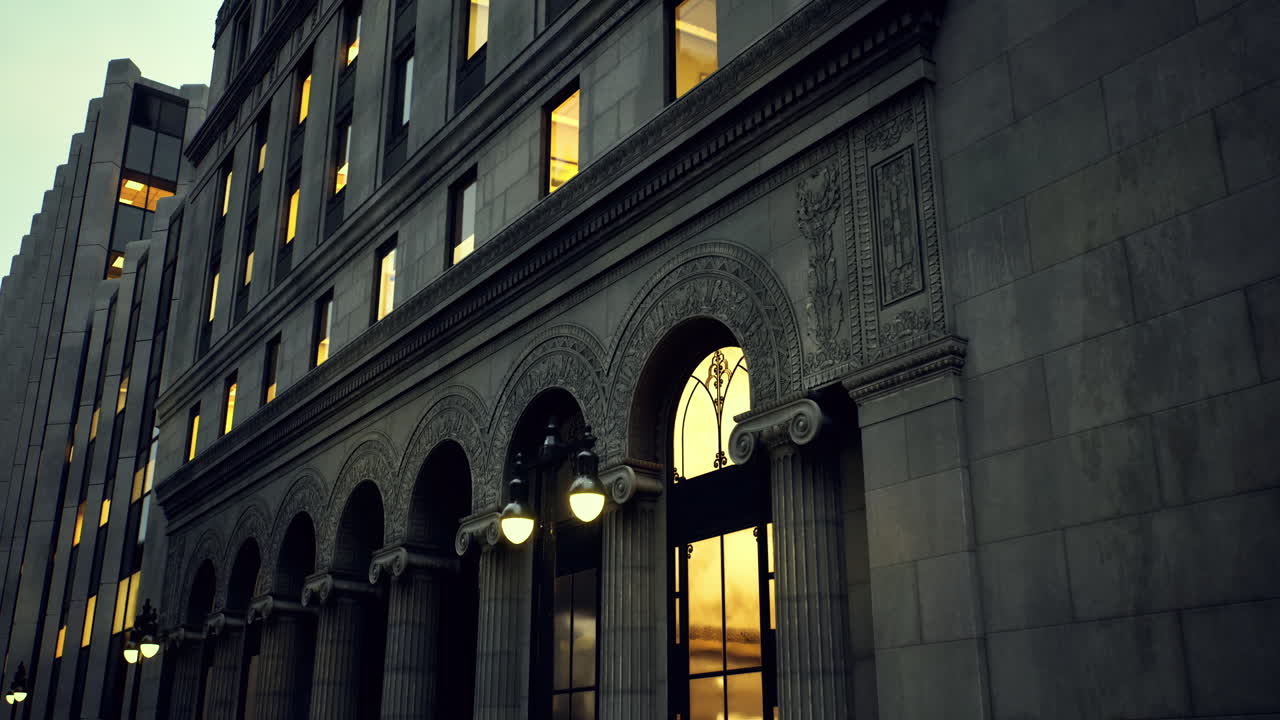 Architectural details of historic building with glowing windows at dusk