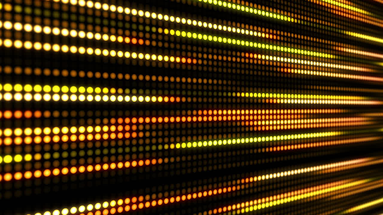 Grid of yellow glowing pixel dots. Effect of movement festive illumination lines. Blurred electronic display background. Looped animation graphics.