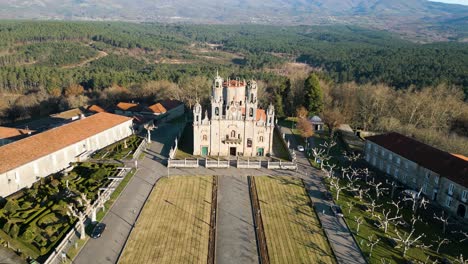 Aerial-pullback-reveals-stunning-courtyard-lawn-of-sanctuary-in-Ourense-Spain